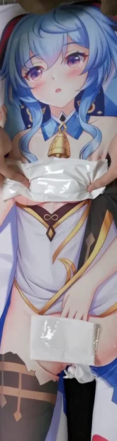 A dakimakura pillow cover/case of Ganyu from Genshin Impact